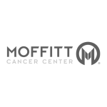 A transparent image of the Moffitt Cancer Center logo. It features the name 'MOFFITT' in bold, uppercase letters with the letter 'O' replaced by a circular symbol that encloses a stylized 'M.' Below in smaller letters is the text 'CANCER CENTER,' all set against a checkered background that indicates the image is transparent.