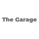 A transparent graphic of the words 'The Garage' in a sturdy, uppercase serif font, centered on a checkered background indicating the image's transparency.